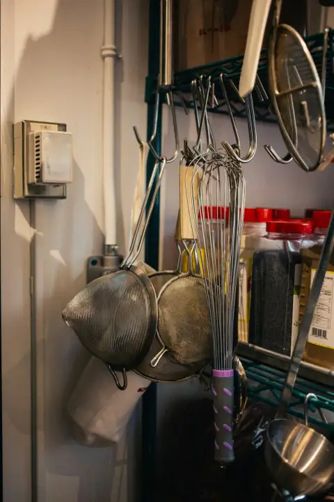 Kitchen tools: kitchen utensils hanging on hook