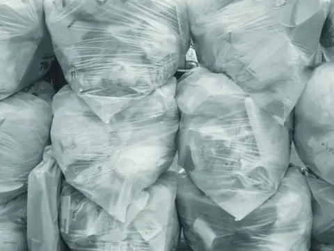 Garbage bags: white and green plastic bags