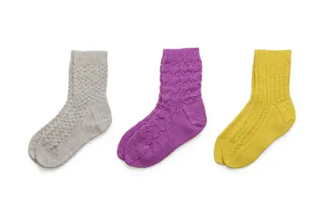 Socks: blue and black socks on white background