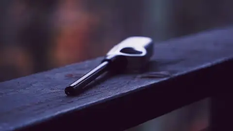 Gas lighters: a pen on a book