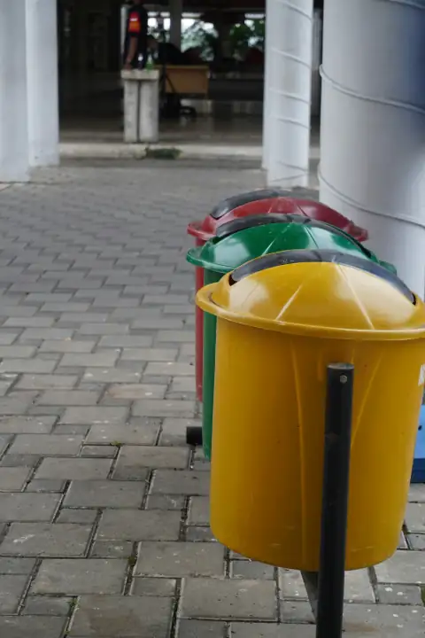 Dustbins: yellow and green trash bin