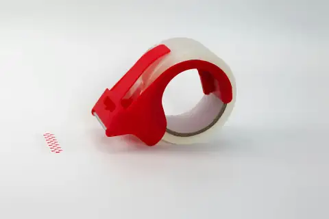 Tapes: Red tape dispenser with clear packing tape