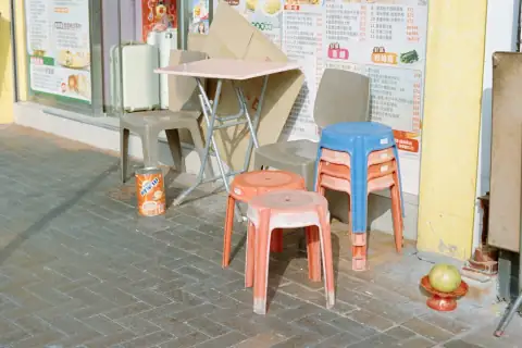 Stools & chairs: Plastic stools and table outside a shop