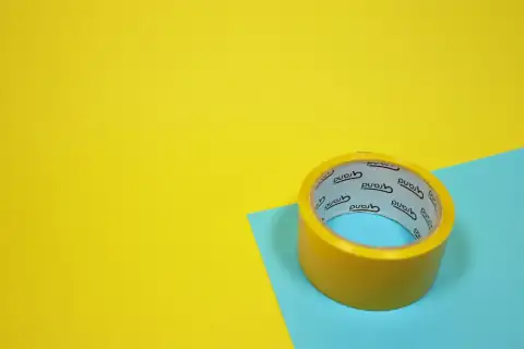 Tapes: yellow duct tape on blue surface