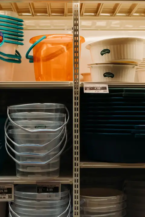 Buckets: white plastic bucket on shelf