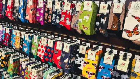 Socks: a display of colorful socks for sale in a store